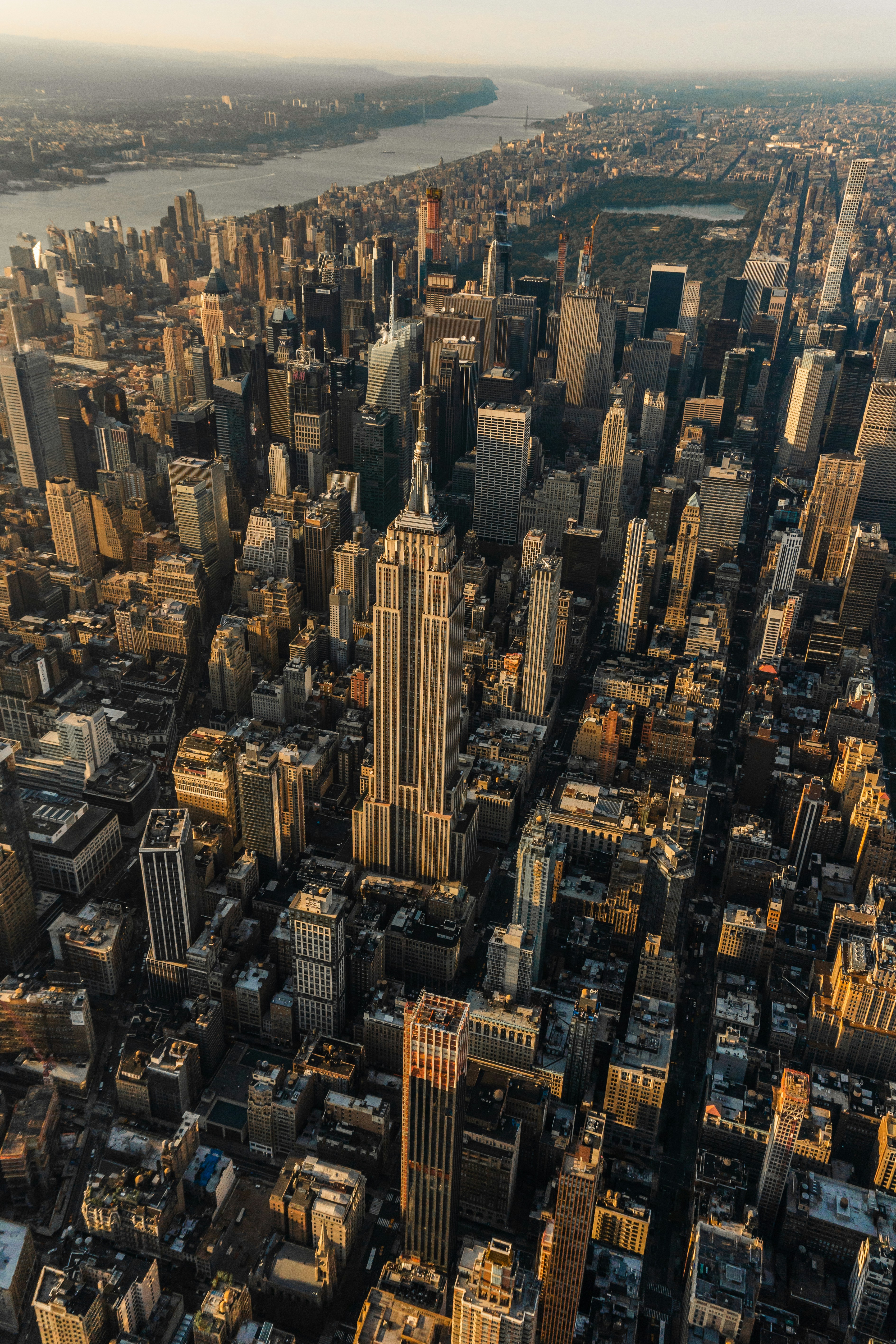 Towering Manhattan skyscrapers converging toward the sky